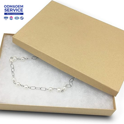 Folding Gift Box Elegant Ribbon Packaging with Embossing for Clothes and Accessories Gift Printing Package Box